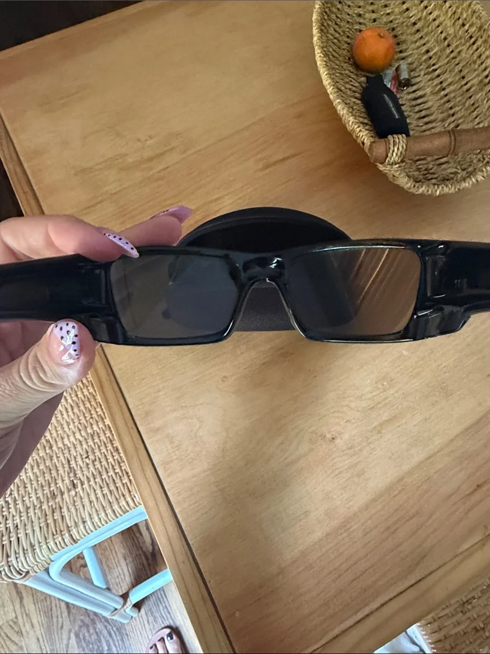Oakley Black Frame Sunglasses with Blue Mirrored Lenses